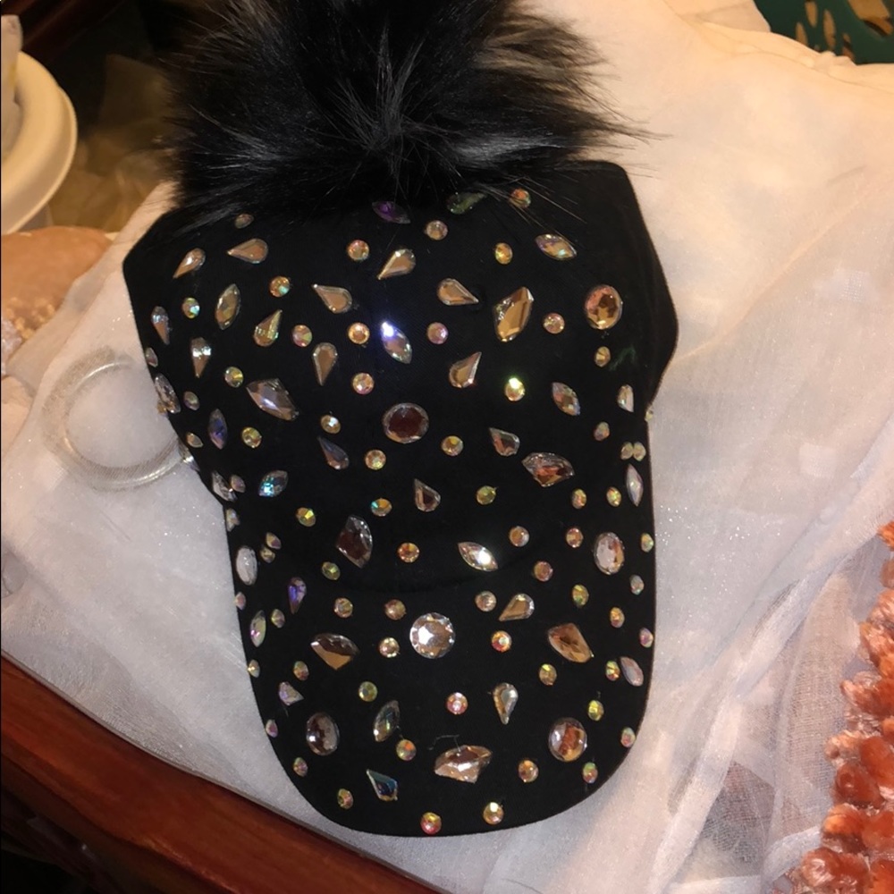 Diamond studded hat with fur ball